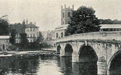 A classic shot of   Henley Bridge   with   Saint Mary's Church   in the distance.