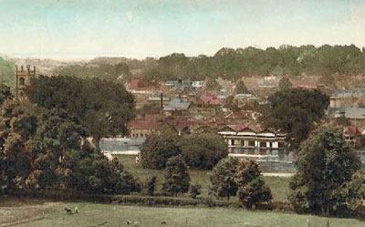 An old picture of Henley-on-Thames showing   Saint Mary's Church   and the   River Thames  .